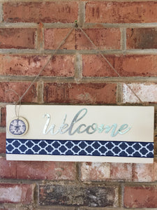 Welcome Sign with a Sand Dollar