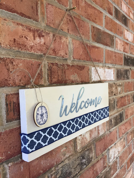 Welcome Sign with a Sand Dollar