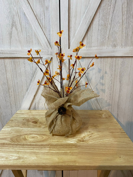 Burlap Sack Arrangement (Greenery or Flowering bush)