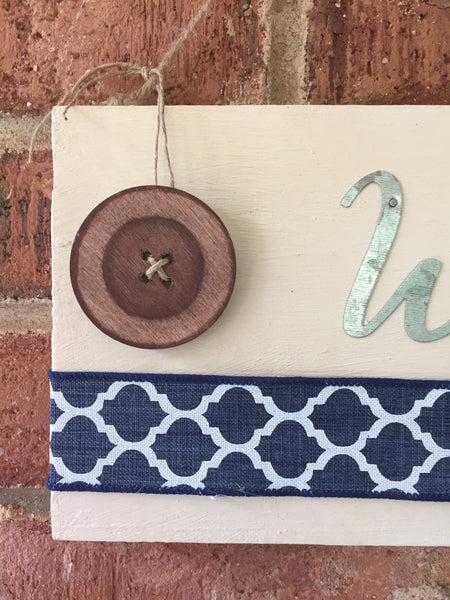 Welcome Sign with a Sand Dollar