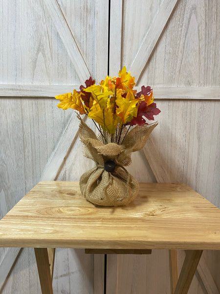 Burlap Sack Arrangement (Greenery or Flowering bush)